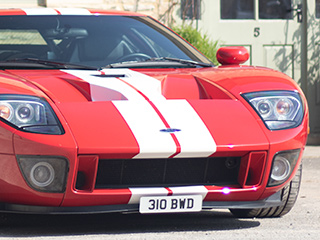George Bamford (Bamford Watch Department) with the number plate 310 BWD