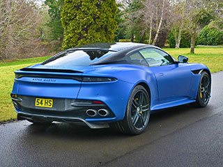 Humayun Saleem with the number plate 54 HS