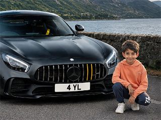 Anis Ahmed with the number plate 4 YL