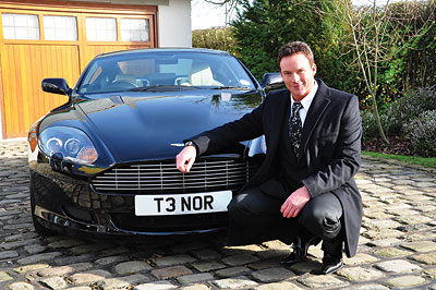 Russell Watson proudly shows his highly appropriate new number plate, T3 NOR Russell Watson with T3 NOR